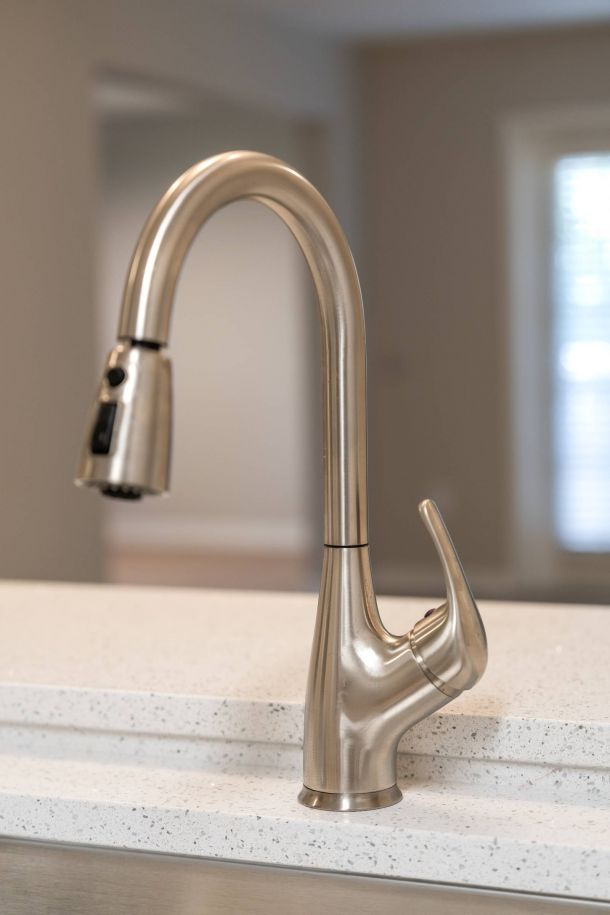 Solace Apartments kitchen faucet close up
